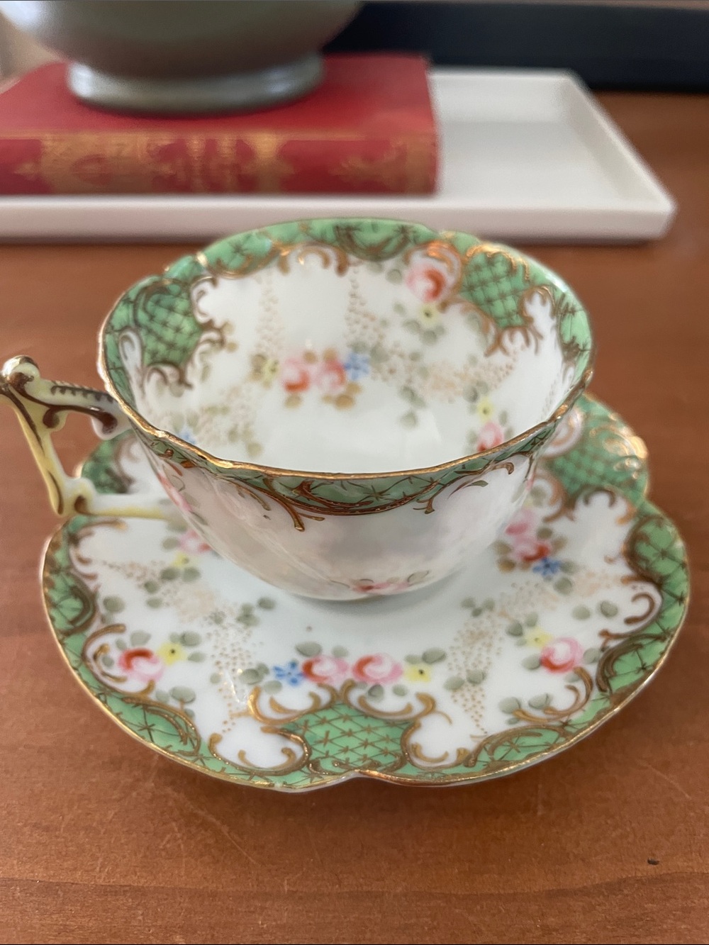 Porcelain Tea Cup and Saucer Set with Green and Gold Accents